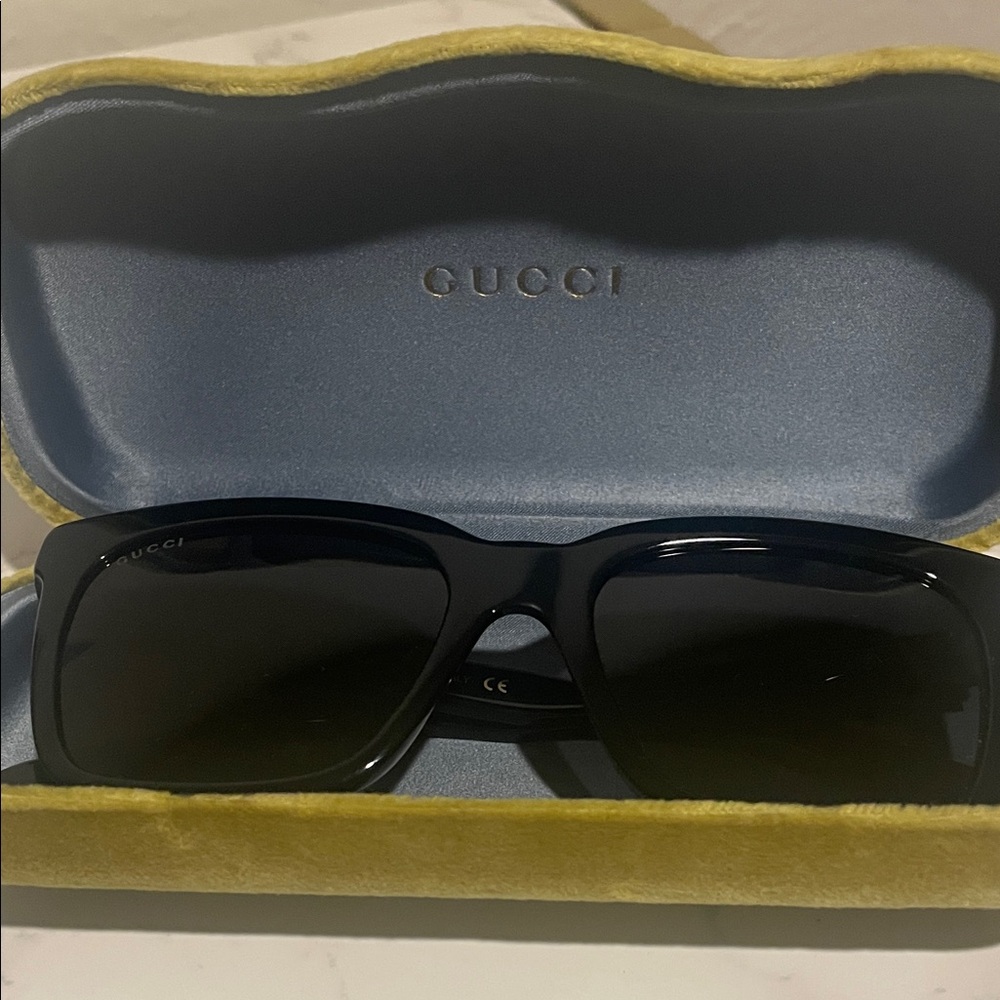 Gucci Black Sunglasses in Yellow Case